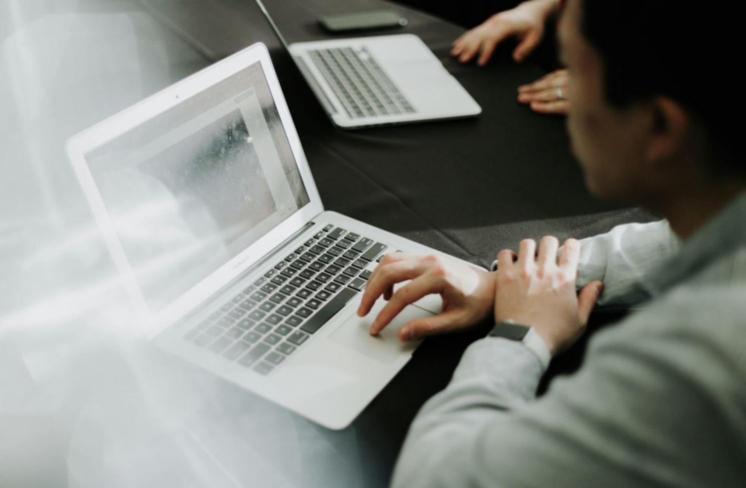 Professional consultation workspace with financial planning materials and documents